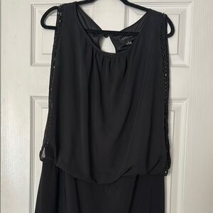 Stylish Black Sleeveless Dress with Sequin Trim